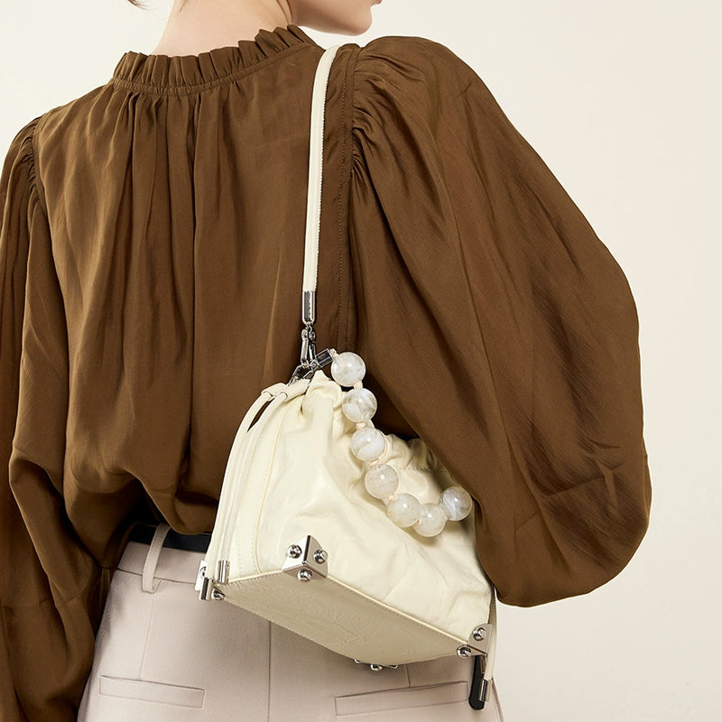 Handheld single shoulder slanted bag